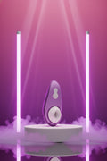Stimulateur clitoridien voyage Womanizer Liberty 2 violet Pleasure Air sans contact 8 niveaux intensité couvercle rangement magnétique silicone hypoallergénique sans phtalates étanche IPX7 rechargeable USB magnétique 10,5x5x4cm